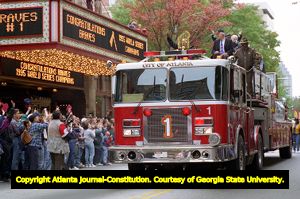 Ted Turner with the World Series trophy during the Atlanta Braves victory parade, 1995