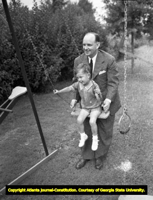 Governor Ellis Arnall with his son Alvan at their home, 1944