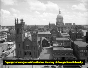 View of the State Capitol and the Church of Immaculate Conception, 1950
