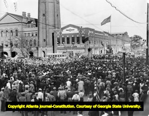 Supporters gather to listen to Eugene Talmadge deliver a campaign speech, 1930s