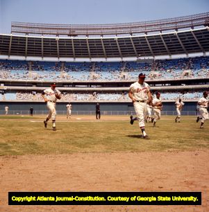 Milwaukee Braves players warming up before an exhibition game against the Tigers in Atlanta, 1965