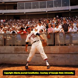 Milwaukee Braves pitcher Clay Carroll warming up in the bullpen, 1965