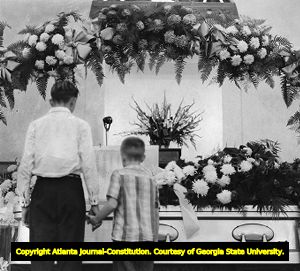 Mourners at the funeral for Senator Walter F. George, 1957