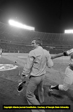Atlanta Braves owner Ted Turner congratulating Ken Henderson on a homerun, 1976