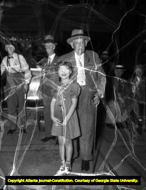 Moore's Ford Bridge mass lynching, July 25, 1946. Unidentified man and child.