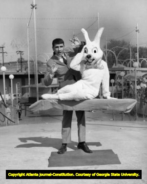 Funtown manager Buddy Farnan performing a magic trick, 1967