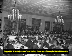 Supporters celebrate with a victory dinner for M. E. Thompson, 1947