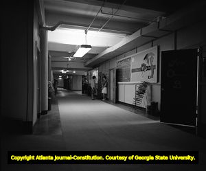Students in a hallway inside Kell Hall at Georgia State University, 1964