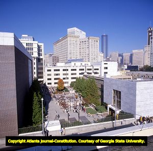 Students hanging out at Library Plaza on Georgia State University's campus, 1980