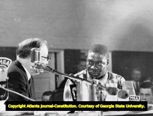 Raymond Jenkins testifies his opinion on integrating public schools for the Sibley Commission, 1960