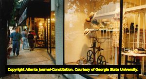 Window shoppers browse the storefronts along Virginia Highland's shopping district, 1993