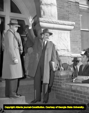 M. E. Thompson waves to supporters in McDonough, 1947