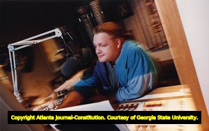 Radio DJ Will Pendarvis during his late night shift at 99X, 1994