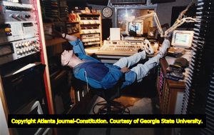Radio DJ Will Pendarvis during his late night shift at 99X, 1994