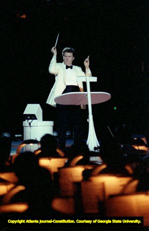 Atlanta Symphony Orchestra music director Yoel Levi conducting during the Olympic opening ceremonies, 1996