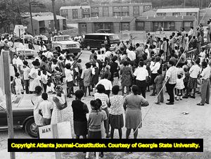 Residents gather to demonstrate against poor public facilities within their neighborhoods, 1969