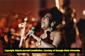 Aretha Franklin performing during a concert at Chastain Park, 1993