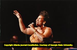 Aretha Franklin performing during a concert at Chastain Park, 1993