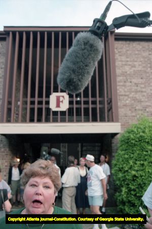 Richard Jewell's mother talks to reporters outside her son's apartment complex, 1996
