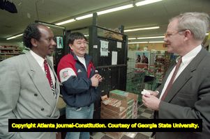 Douglas C. Dean and Joe Martin discuss the redevelopment of the Summerhill neighborhood, 1995
