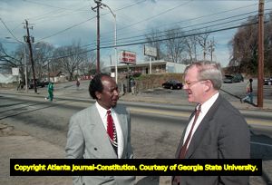 Douglas C. Dean and Joe Martin discuss the redevelopment of the Summerhill neighborhood, 1995