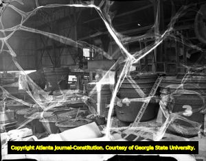 Blast furnace pouring molten steel inside the Atlantic Steel Company mill, 1940s