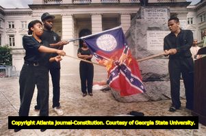 Students for African American Empowerment lead a flag burning demonstration against the use of the Confederate symbol within the state flag, 1992