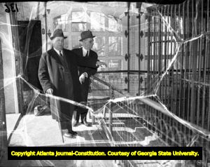 Asa G. Candler visiting the exhibits at the Candler Zoo, 1930s