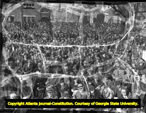 Audience and news crews watching the inauguration of Governor Eugene Talmadge, 1941