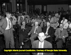 Packed courthouse watches the murder trial of John Wallace, 1948