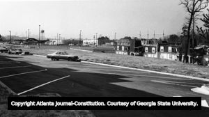 Ambassador Apartments (right) on Piedmont Avenue; MARTA station on left, Atlanta, Georgia, March 15, 1984.
