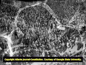 Audience and news crews watching the inauguration of Governor Eugene Talmadge, 1941
