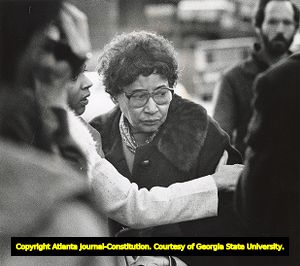 Faye Williams leaving the Fulton County Courthouse during the murder trial of her son Wayne Williams, 1982