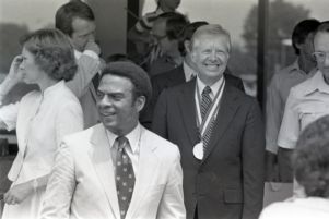 President Jimmy Carter with Mayor Andrew Young during an Atlanta Fourth of July parade, 1981