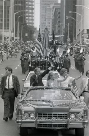 Crowds in downtown Atlanta watching President Jimmy Carter in a Fourth of July parade, 1981