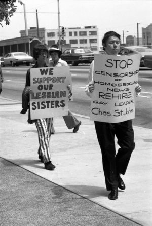 LGBTQ rights activists protesting outside the Atlanta Journal-Constitution building over the termination of a gay employee and lack of news coverage, 1973
