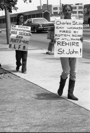 LGBTQ rights activists protesting outside the Atlanta Journal-Constitution building over the termination of a gay employee and lack of news coverage, 1973