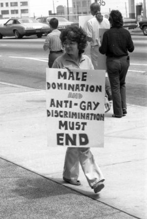 LGBTQ rights activists protesting outside the Atlanta Journal-Constitution building over the termination of a gay employee and lack of news coverage, 1973
