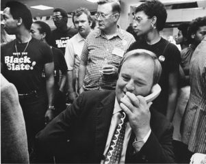 Secretary of State Max Cleland talking with former President Jimmy Carter during election night results at his campaign headquarters, 1982