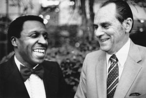 District Attorney Lewis R. Slaton with Judge Clarence Cooper at a banquet, 1983