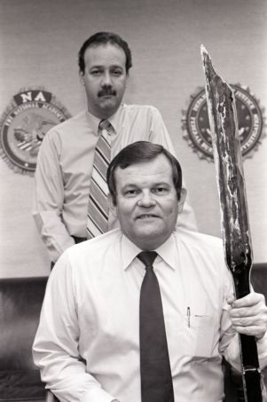FBI Agents Weldon Kennedy and Diader Rosario pose with weapons confiscated from the Cuban prison riot in Atlanta, 1987