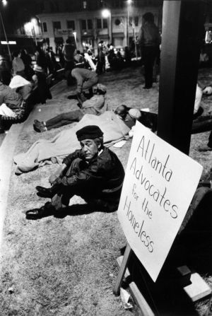 Demonstrators holding a night vigil at Central City Park in support of year-round homeless shelters in Atlanta, 1984