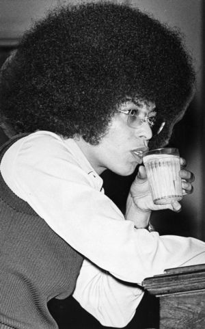 Political activist Angela Davis speaking at the Atlanta University Center to raise money for political prisoners, 1972