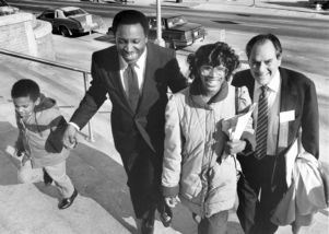 Judge Clarence Cooper and Attorney Lewis Slaton attending a NAACP Youth Council program, 1986