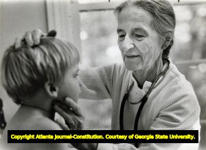 Dr. Leila Denmark examines a young patient at her pediatric office, 1982
