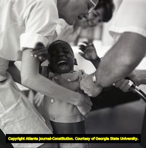 Young child is administered the Rubella vaccine during a vaccination day at a Decatur elementary school, 1970
