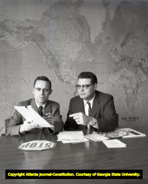 CDC Deputy Director Dr. James Mason with Dr. Freckleton working on a Rubella vaccine program for children, 1970