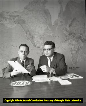 CDC Deputy Director Dr. James Mason with Dr. Freckleton working on a Rubella vaccine program for children, 1970