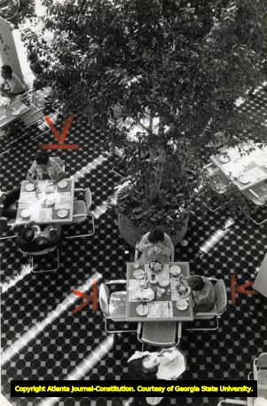 Diners eating at the new Colony Square restaurant Trellises, 1978