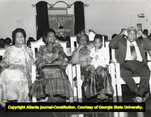Alberta Williams King with Martin Luther King Sr., Coretta Scott King, during a celebration honoring Mrs. King for her years as church organist and director, 1972